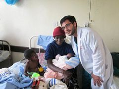 Midwife Volunteering: Ben (USA) having just helped a delivery